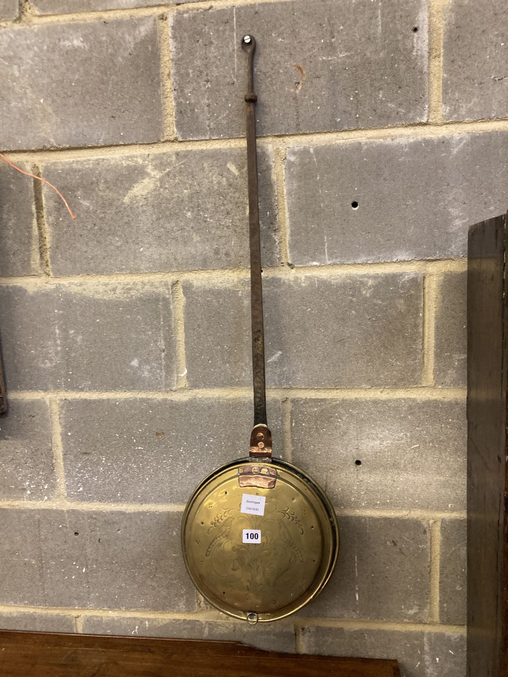 A Victorian engraved brass warming pan, with wrought iron handle, length 100cm